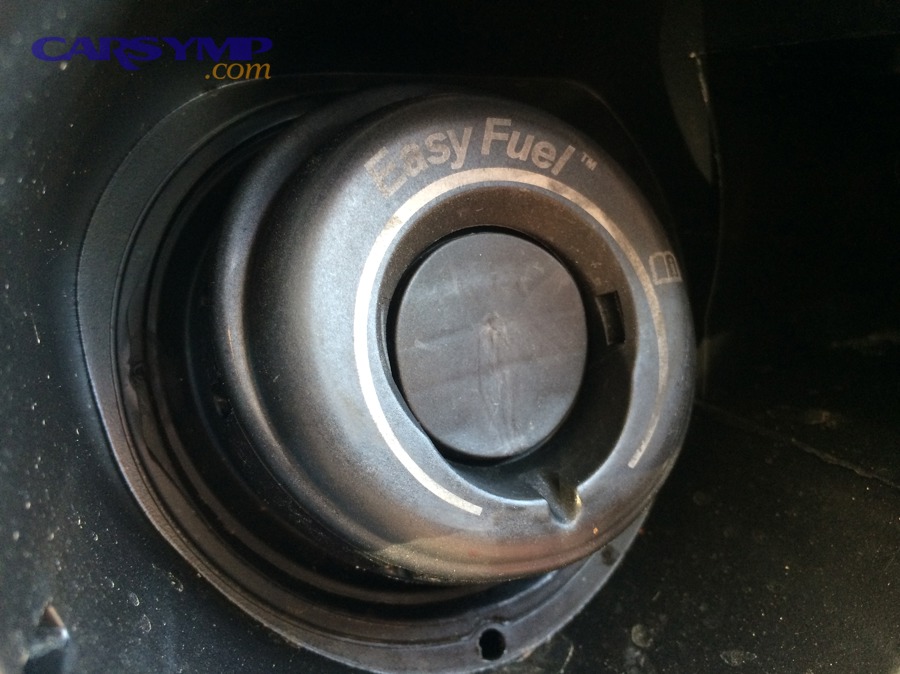 Capless fuel filler system example