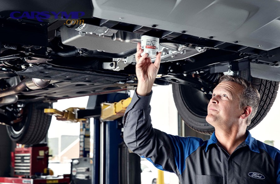 Car service station bays (illustrates maintenance performed in structured service environments)