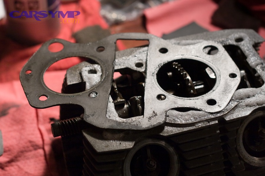 Head gasket close-up photo showing gasket shape and openings