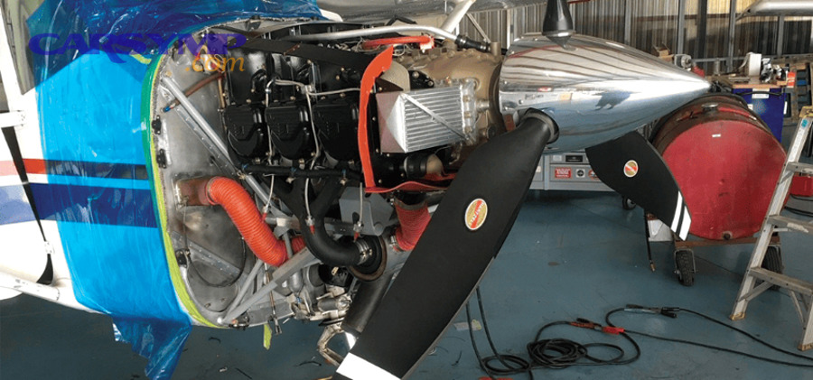 Photo showing dark fluid around a hydraulic motor mount area