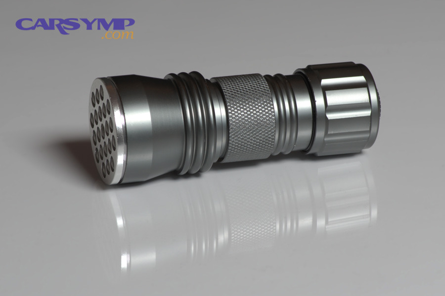 LED UV black light flashlight used to illustrate leak verification and fluorescent inspection