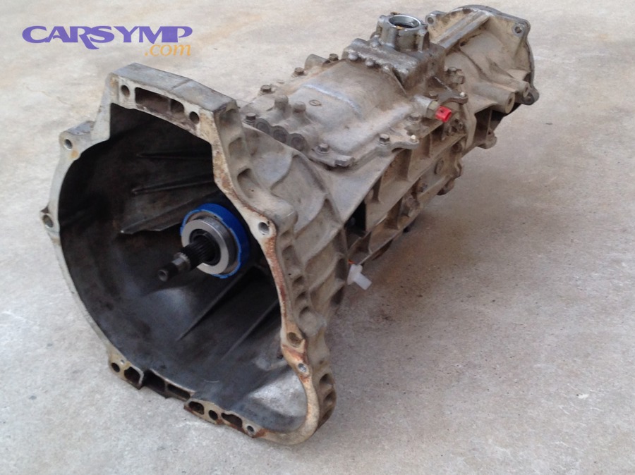 External view of a manual transmission case showing bellhousing and main casing