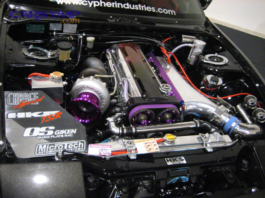 Engine bay view showing components and hoses