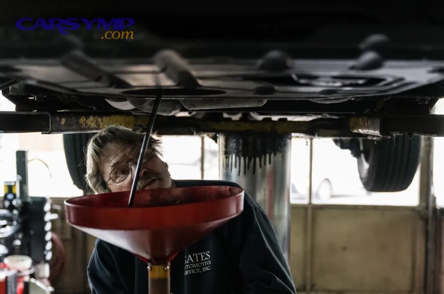 Oil dipstick level marks showing min and max range