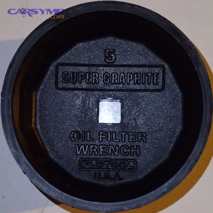 Oil filter wrench used to loosen a spin-on oil filter