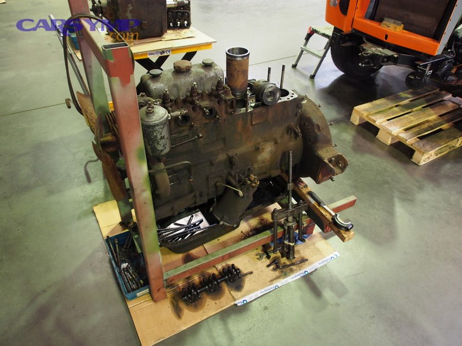 Old engine block image representing rebuild vs replacement decisions