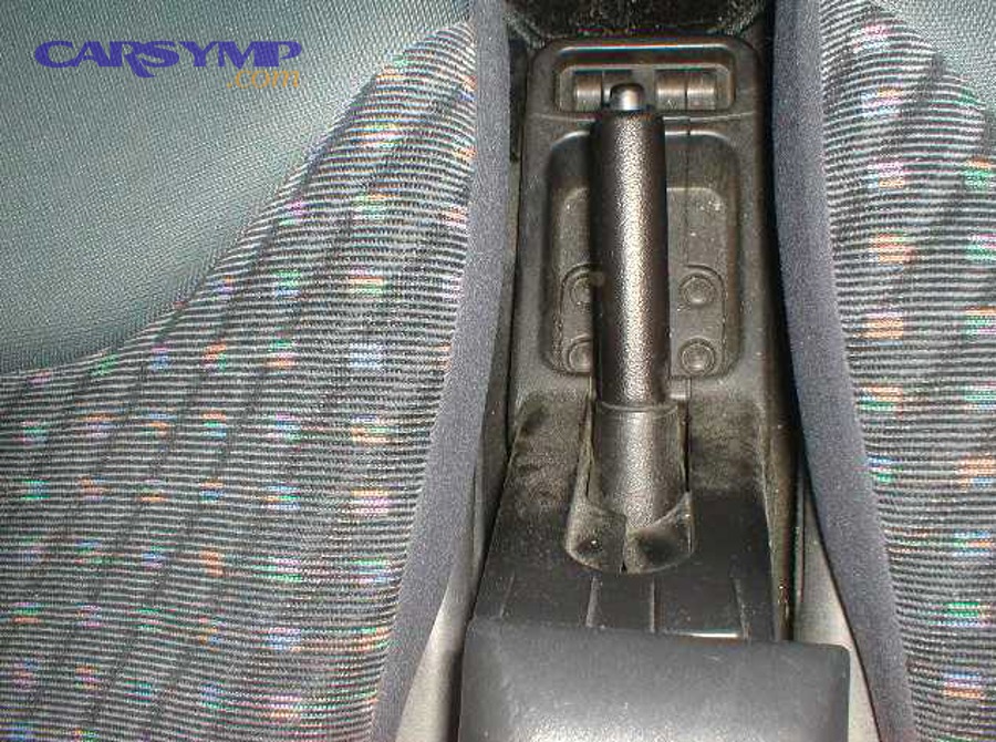 Traditional manual parking brake handle for comparison