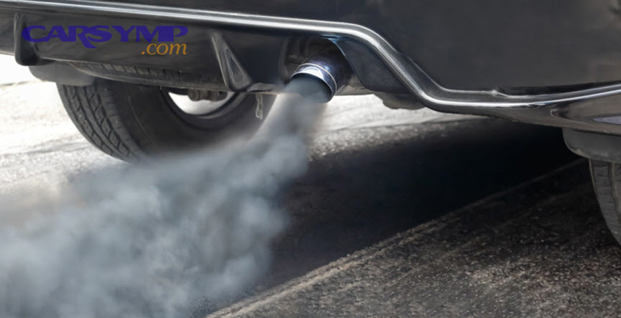 Car on a lift in an auto repair shop service bay