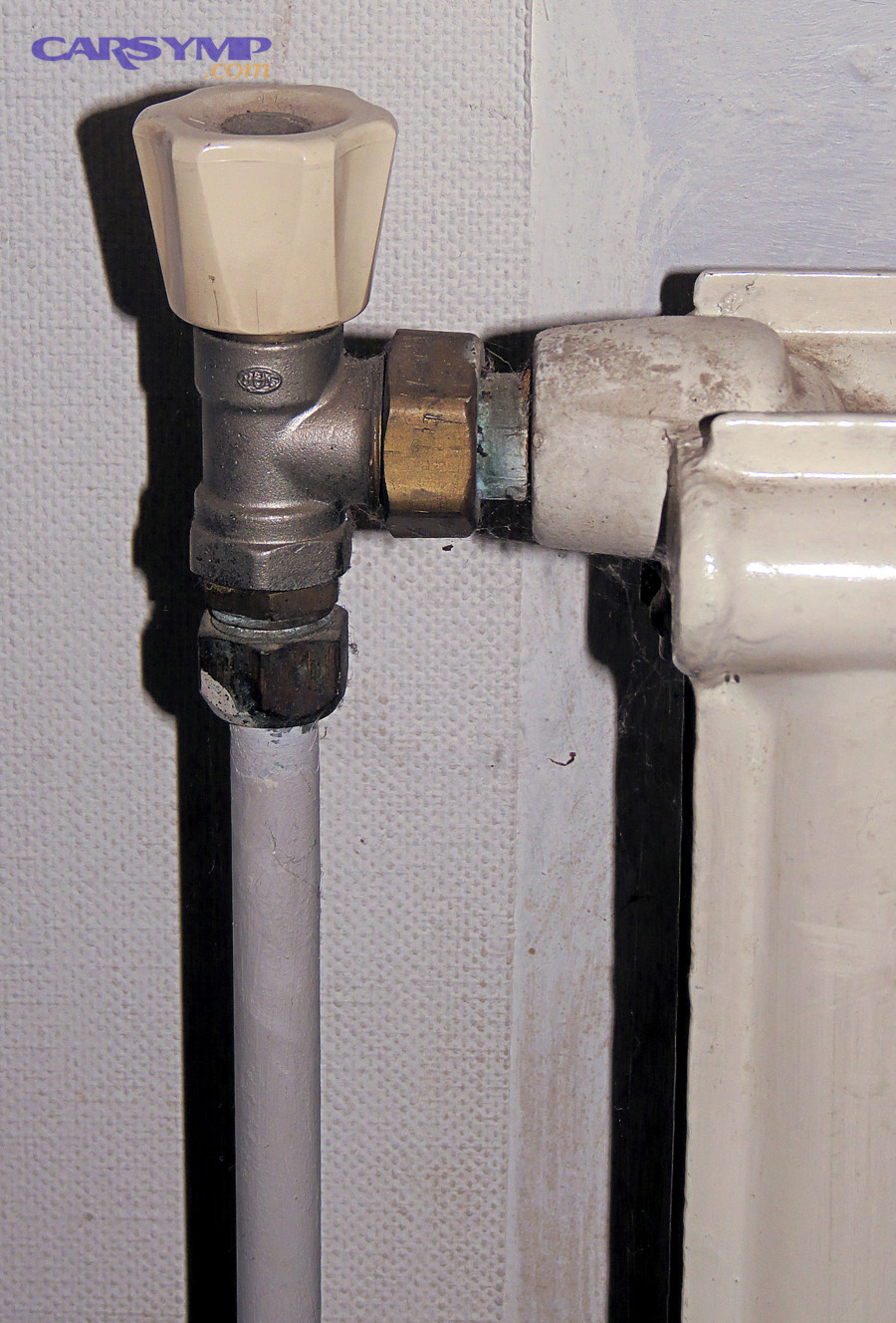 Close-up of a valve and fitting used in fluid systems