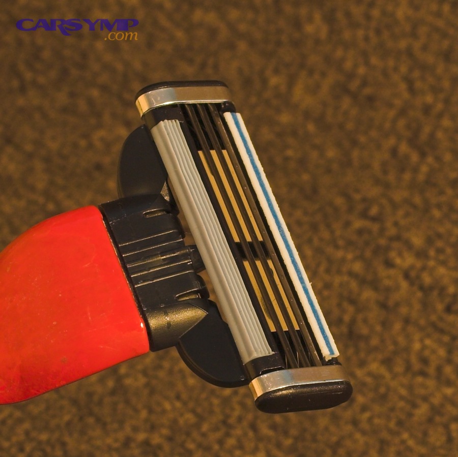 Razor blade image representing careful scraping tools used for gasket surface preparation