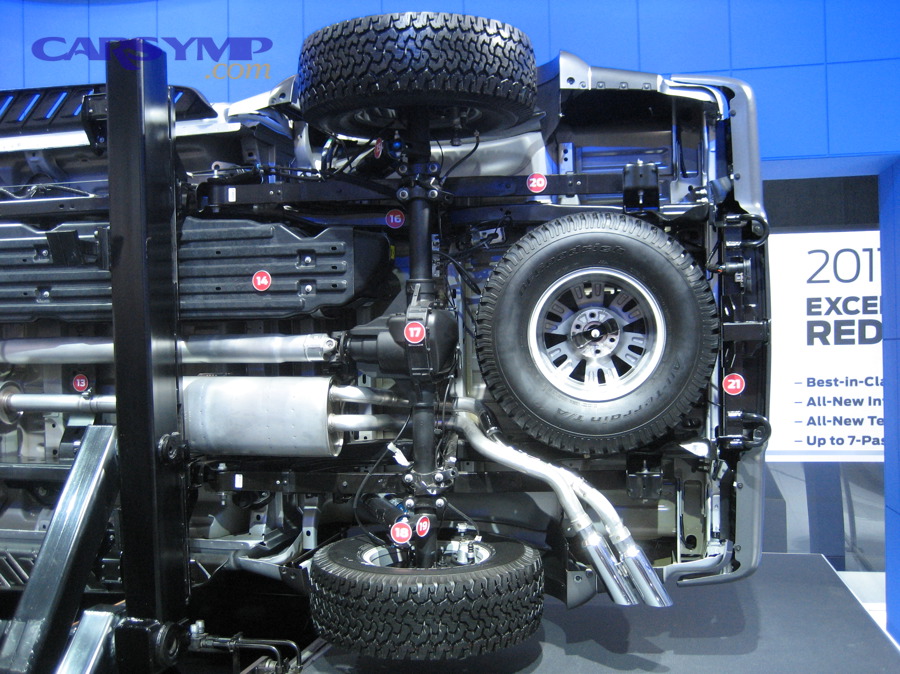 Vehicle underbody view showing chassis components