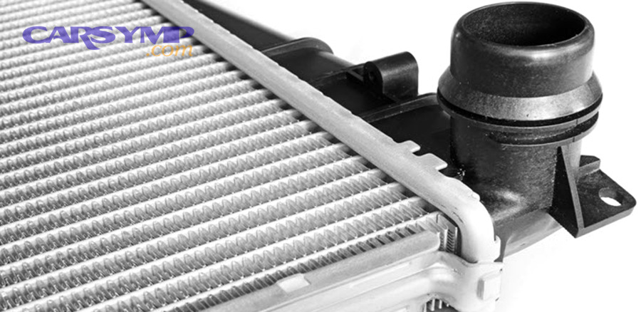 clogged radiator showing mineral deposits and debris buildup