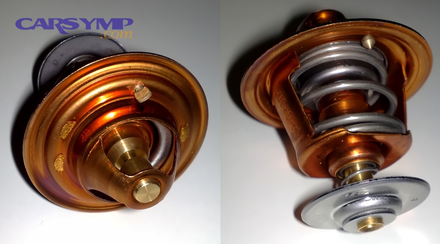 Replacement automotive thermostat showing spring and valve