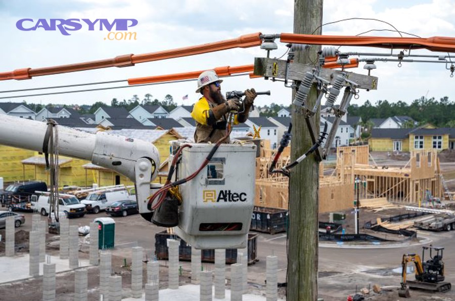 Person tracking work time on laptop representing hourly billing and time logs