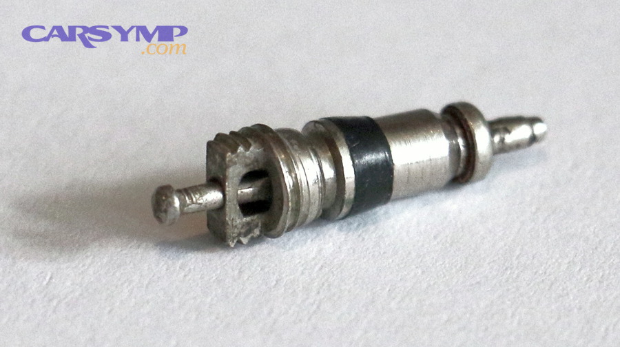 Tire valve stem and valve core used to connect an inflator hose