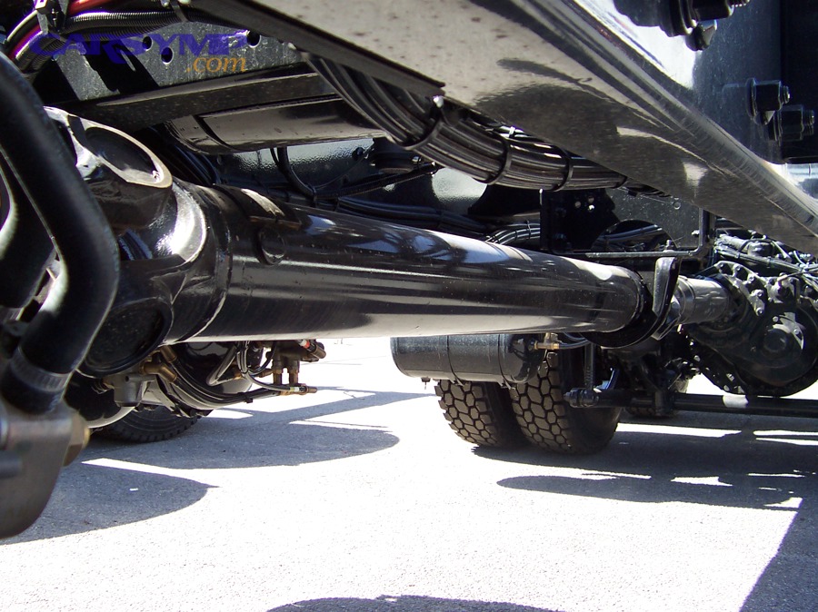 Driveshaft with universal joints that can cause vibration and humming if worn or imbalanced