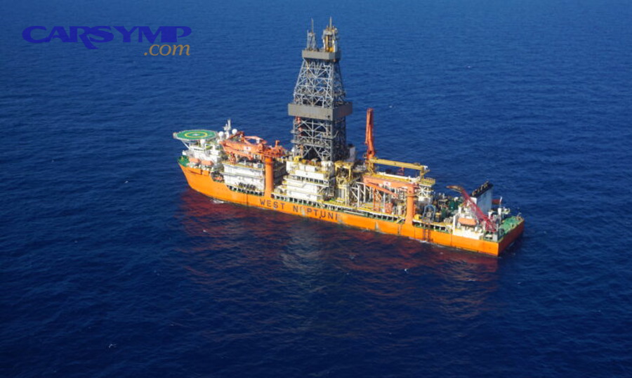 Oil level on a dipstick near marked range