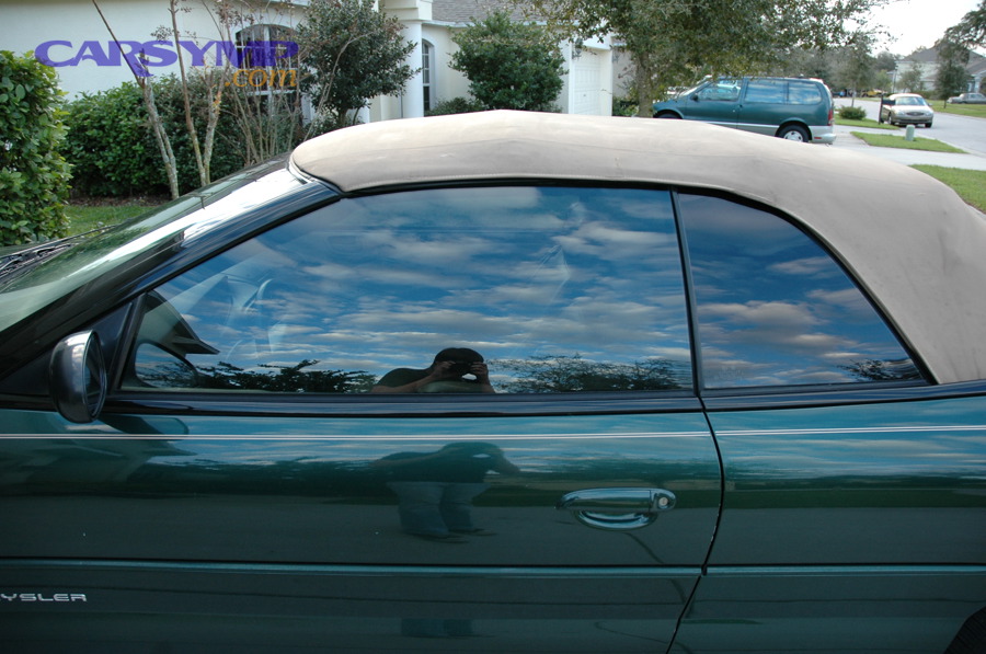 Car window tint film applied to side windows