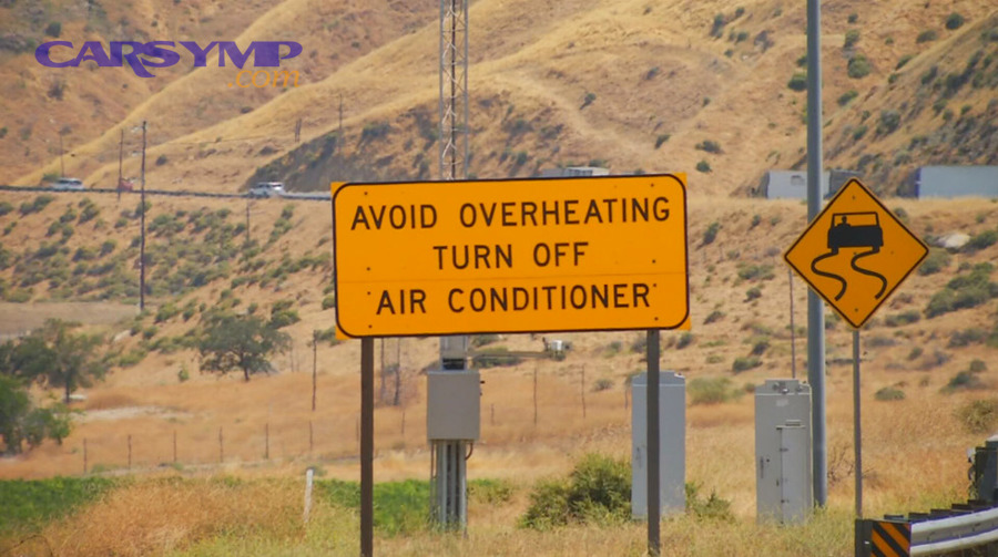 What should you do immediately while still moving to reduce risk and reach a safe stop?