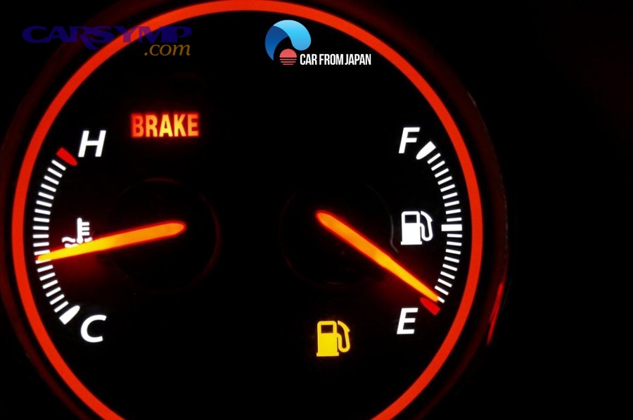 OBD scanner used inside vehicle to read coolant temperature and codes like P0128