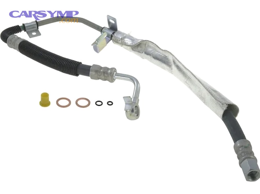 Heater hose area in engine bay with hoses leading toward firewall