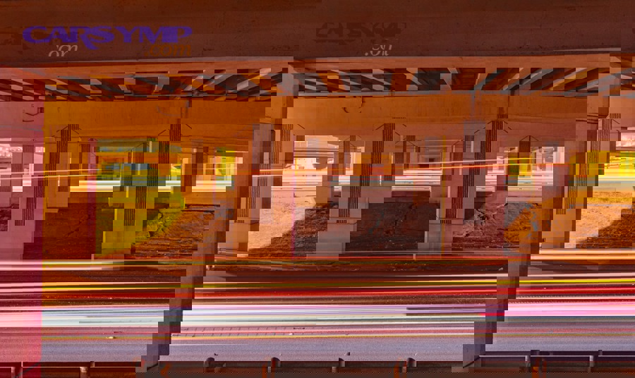 Highway scene suggesting safe pull-off and situational awareness