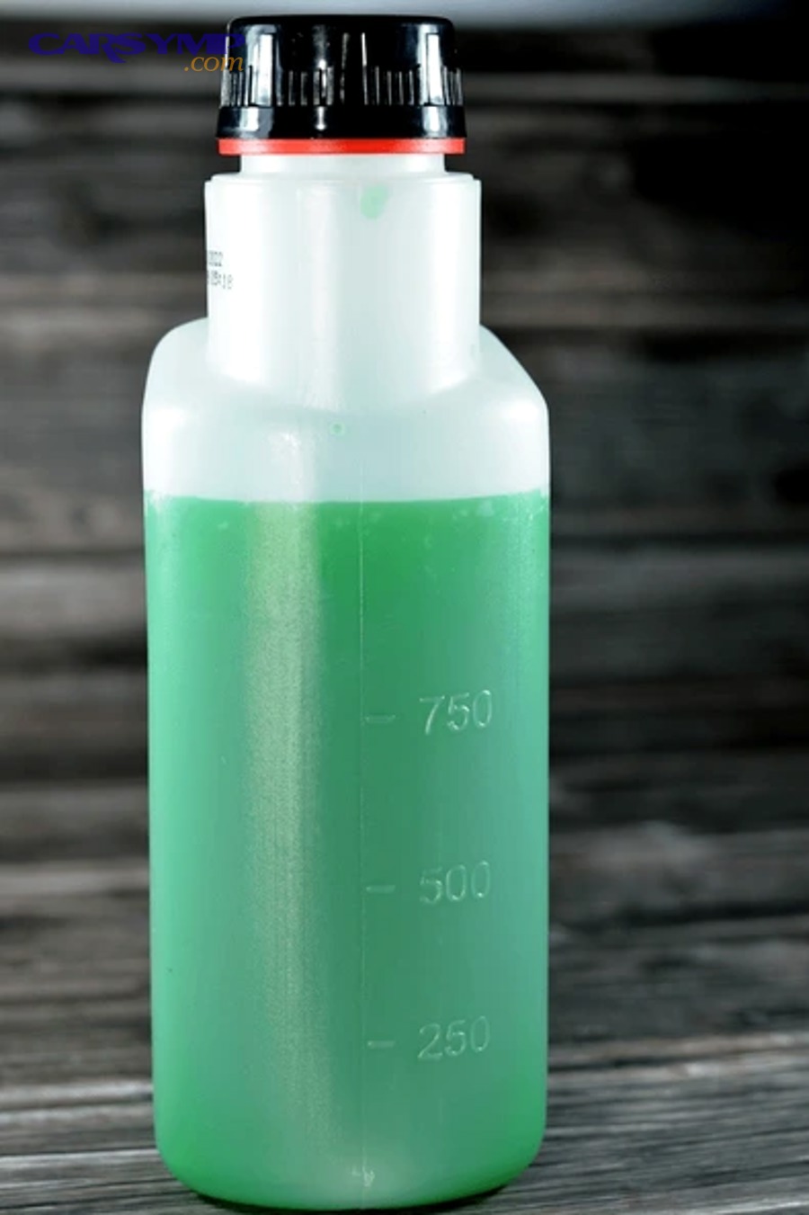 Engine coolant reservoir showing MAX and MIN level markings