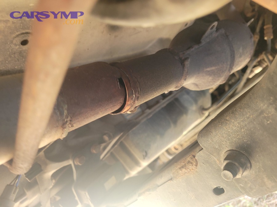 Vehicle undercarriage rust that contributes to exhaust corrosion