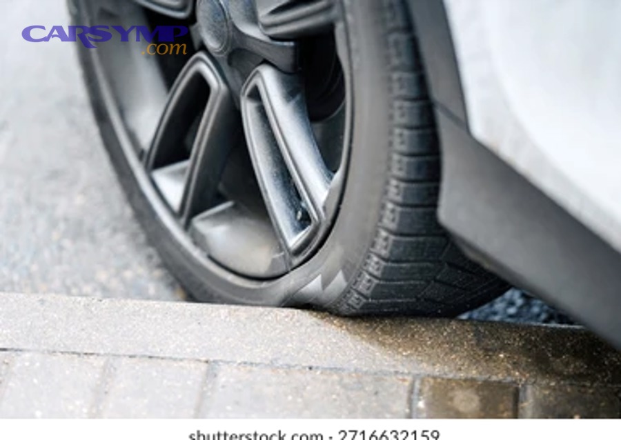 Example of a tire sidewall bulge or bubble indicating internal damage