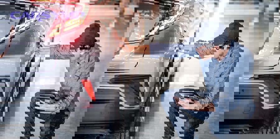 Car parked with hood open for inspection and service access