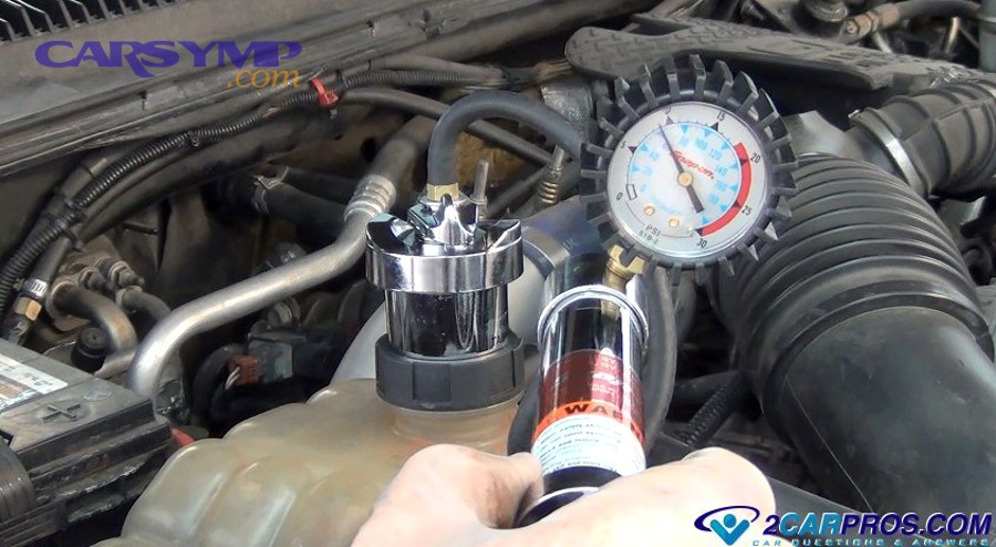 Testing radiator cap pressure with diagnostic tool showing PSI rating
