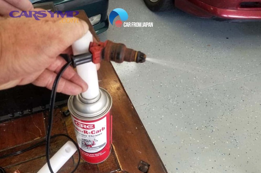 Auto workshop setting where professional injector cleaning services may be performed