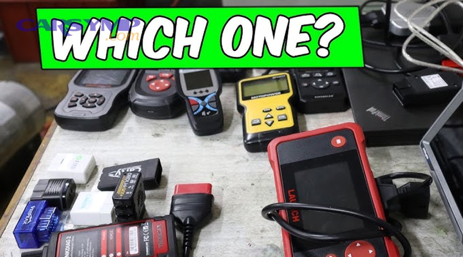 Close-up of an OBD-II port under a dashboard