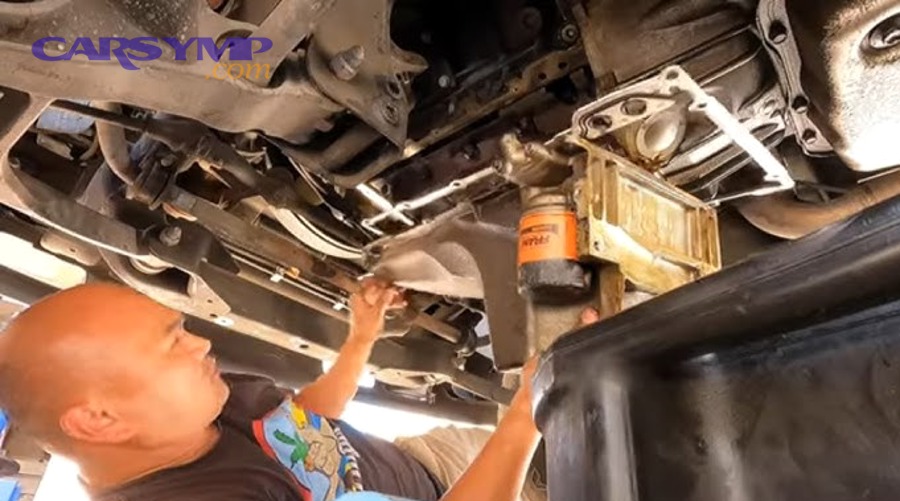 DIY oil pan gasket replacement concept image showing underside access and repair workflow
