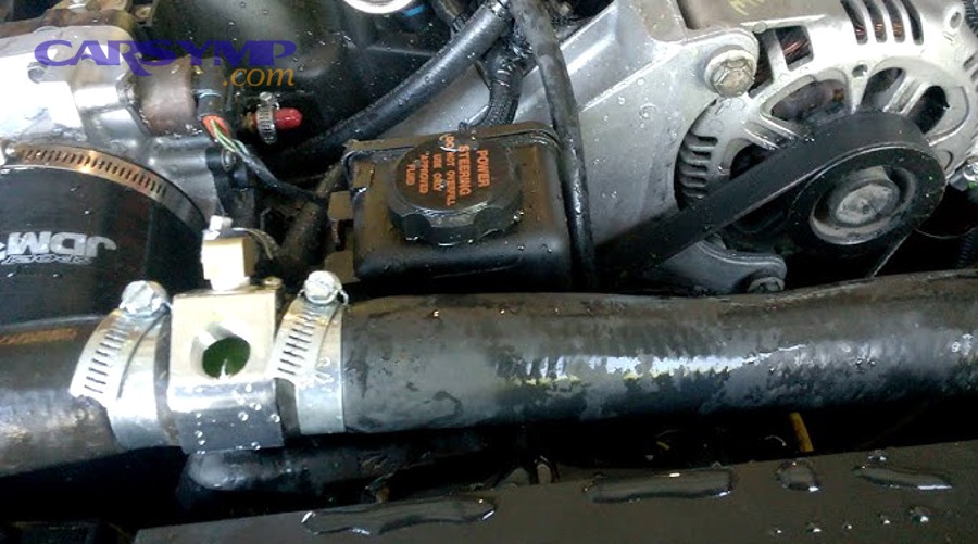 Coolant expansion tank with cap and level markings