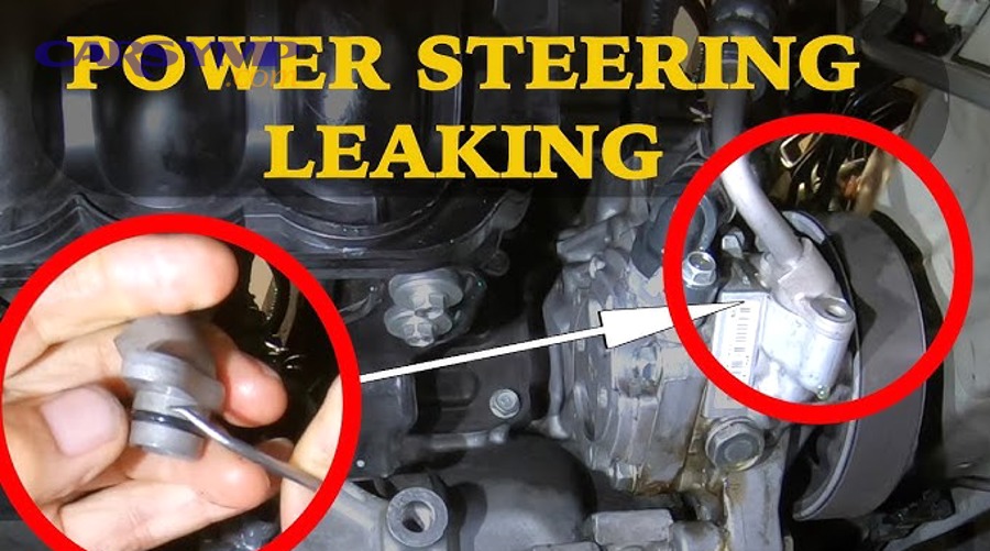Person checking power steering fluid reservoir level