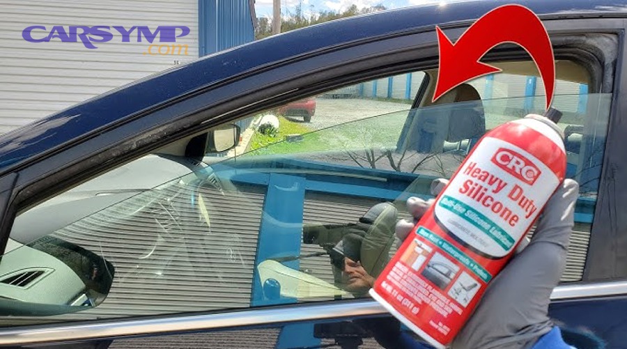 person testing car window operation after lubrication maintenance