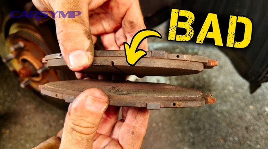 Worn brake rotor showing deep grooves and heat damage