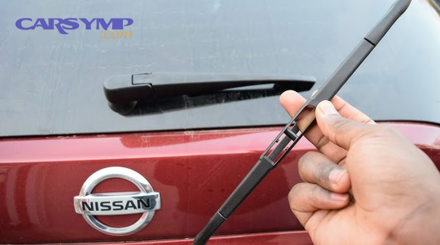 Close-up of damaged wiper blade attachment from forcing removal