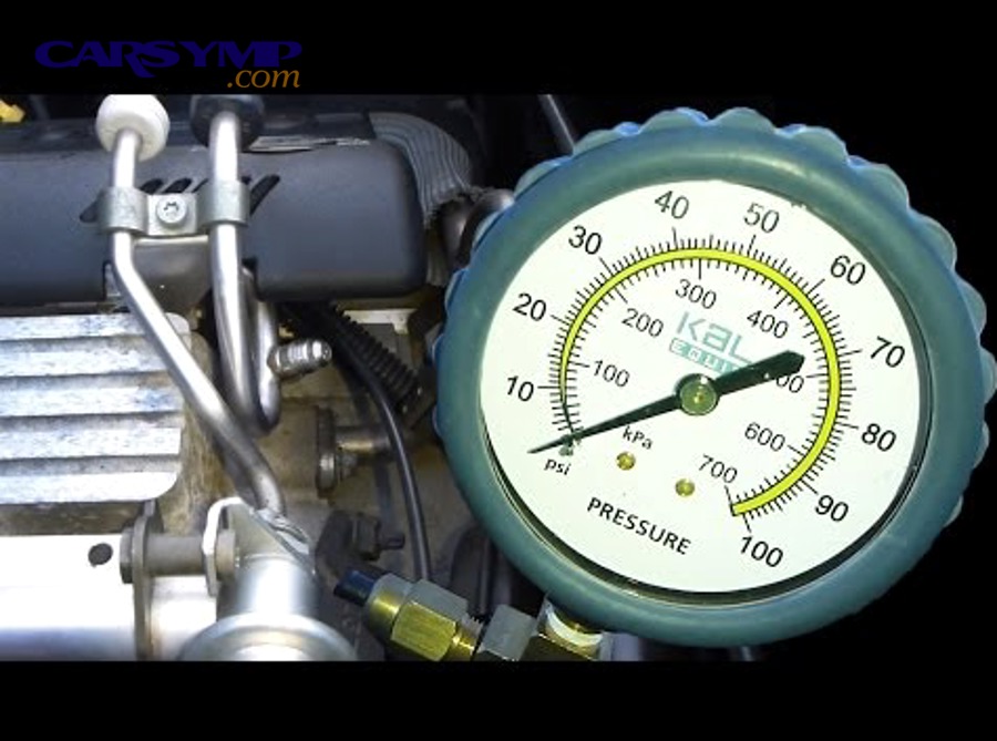Fuel pressure gauge connected to Schrader valve on fuel rail