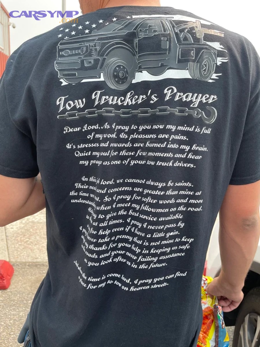 Tow truck loading a car onto a flatbed