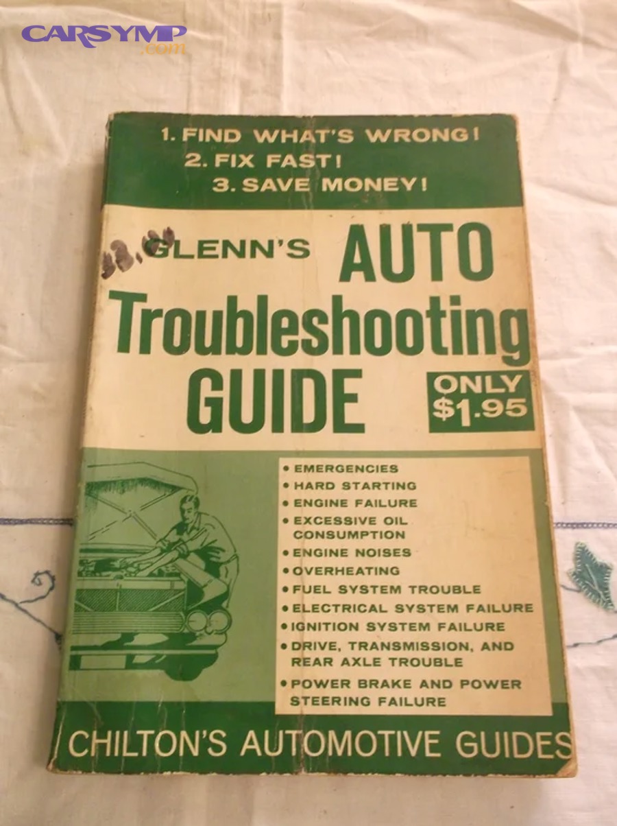 Valve cover gasket area showing signs of oil leakage near engine top