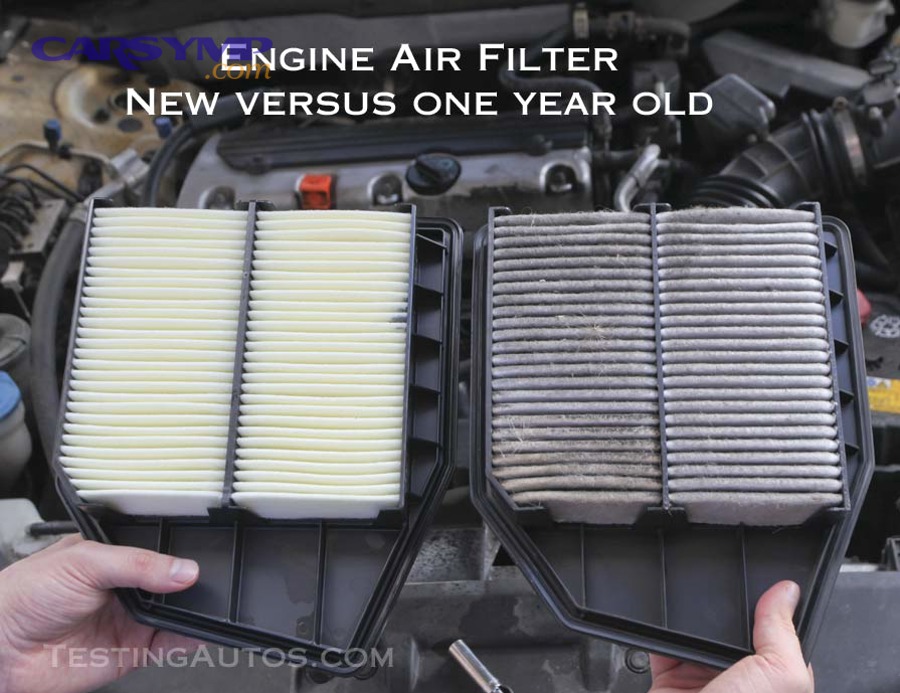 mechanic performing oil change and filter inspection