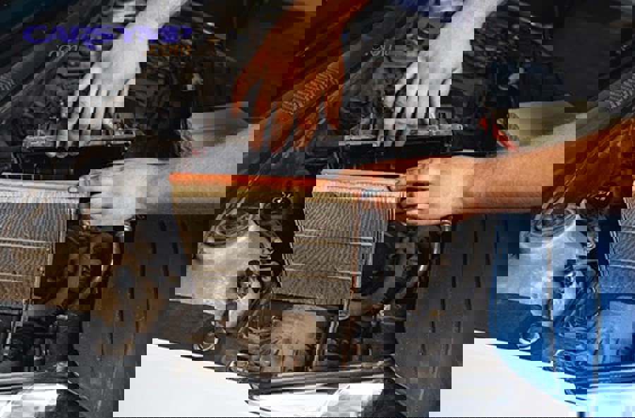 Radiator fan with shroud that helps pull air through radiator core