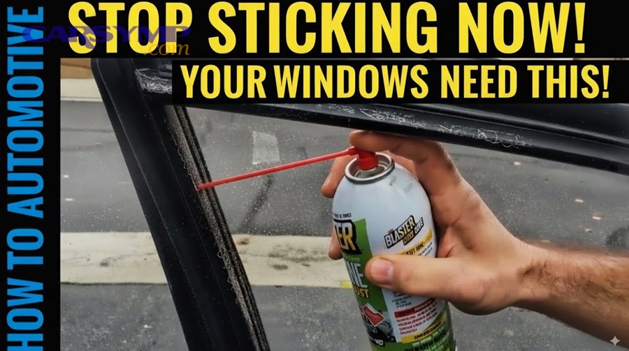 mechanic applying lubricant to car door window mechanism