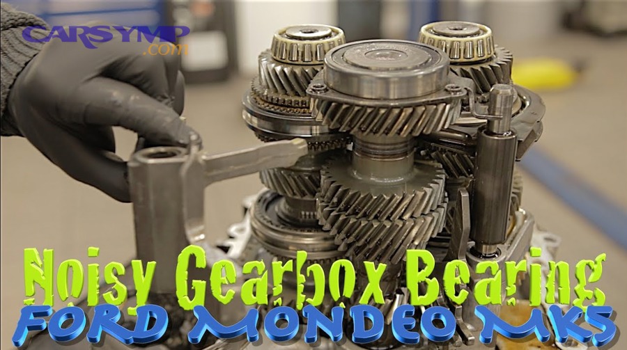 Manual transmission cutaway showing gears and bearings