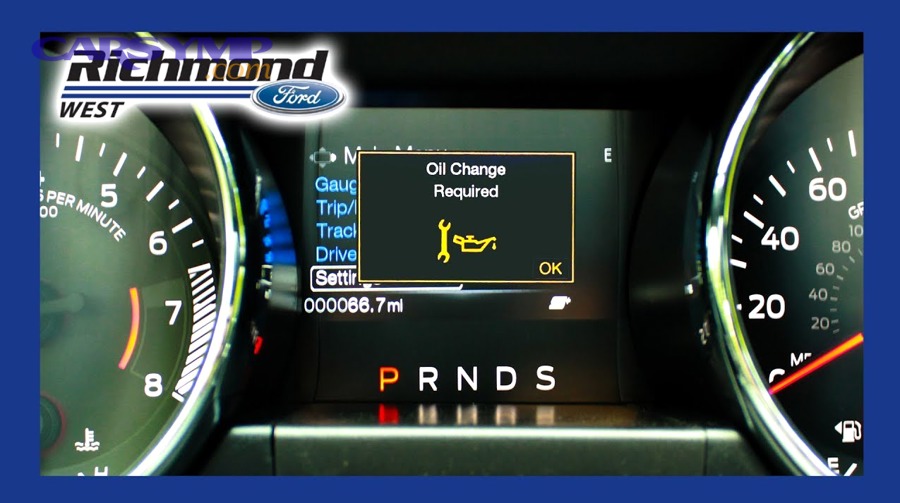 Engine oil dipstick used to check oil level and condition