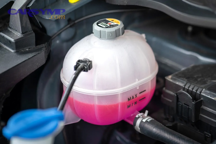 What else should you check after verifying coolant level to prevent repeat low-coolant issues?