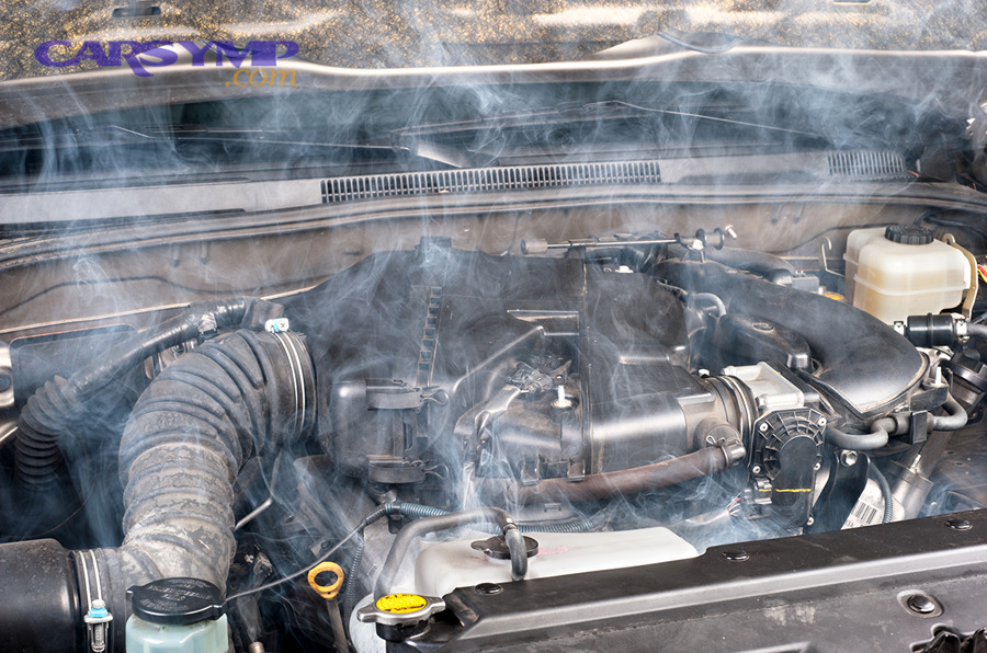 Infrared thermometer used to measure heater hose temperatures for diagnosis