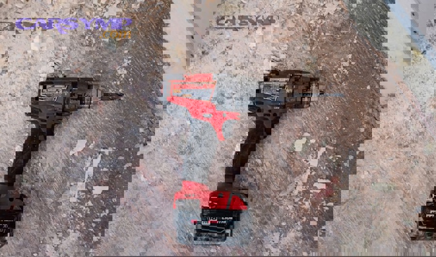 Torque wrench being used on brake caliper mounting bolt